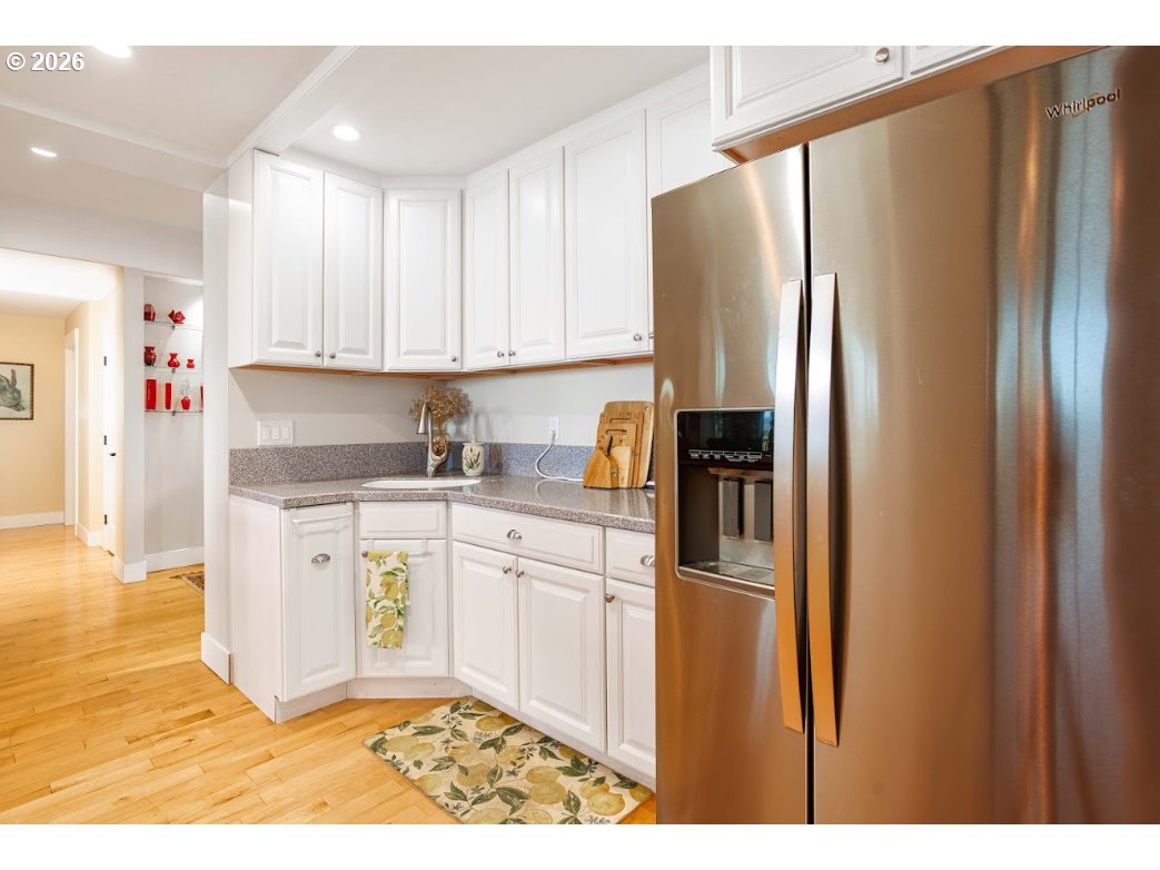 787 South Sunset Lane Ridgefield, WA 98642 - Photo 17 of 43 a kitchen with stainless steel appliances granite countertop a refrigerator sink and cabinets