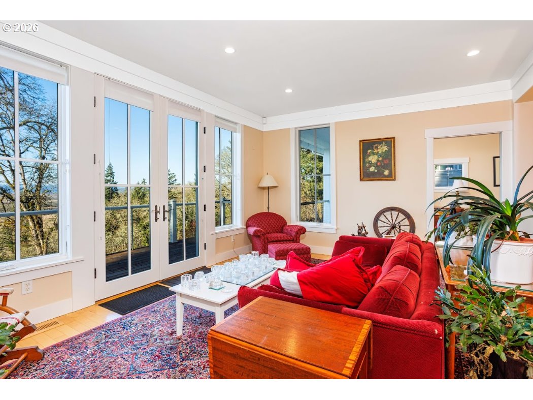 787 South Sunset Lane Ridgefield, WA 98642 - Photo 19 of 43 a living room with furniture and large windows