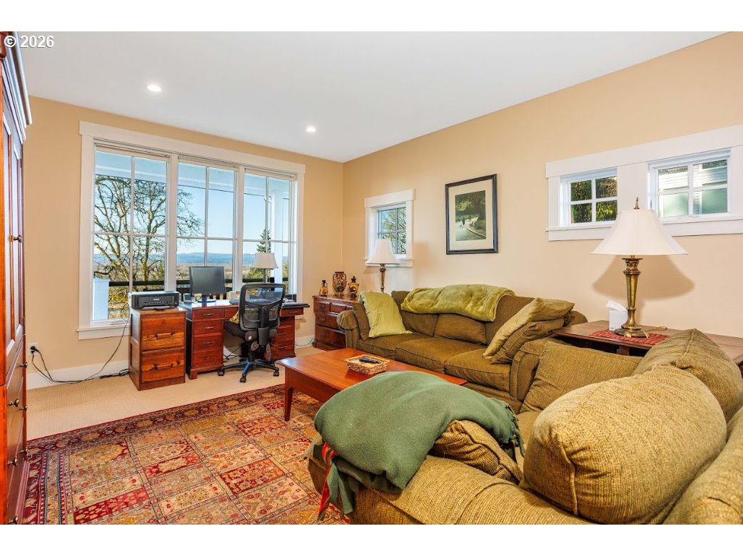 787 South Sunset Lane Ridgefield, WA 98642 - Photo 22 of 43 a living room with furniture and a large window