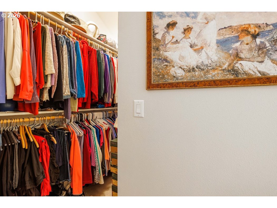 787 South Sunset Lane Ridgefield, WA 98642 - Photo 30 of 43 a view of walk in closet with clothes