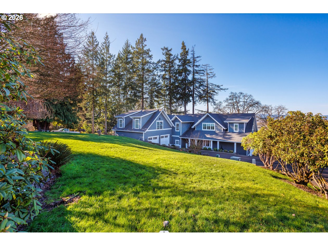 787 South Sunset Lane Ridgefield, WA 98642 - Photo 43 of 43 a view of a large house with a big yard and large trees