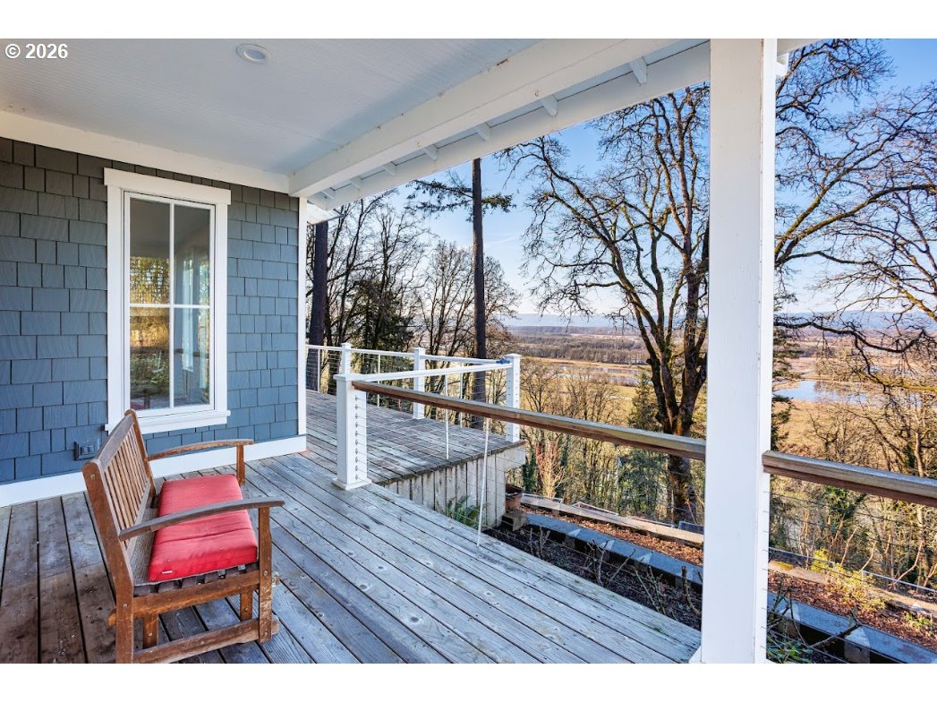 787 South Sunset Lane Ridgefield, WA 98642 - Photo 6 of 43 a view of a balcony with wooden floor and outdoor seating