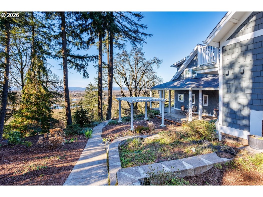 787 South Sunset Lane Ridgefield, WA 98642 - Photo 10 of 43 a view of a house with backyard and sitting area