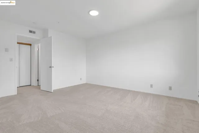 an empty room with an entryway