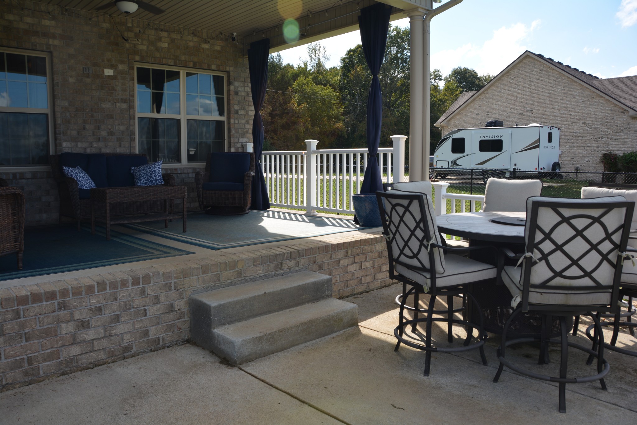 675 Elrod Road Manchester, TN 37355 - Photo 11 of 39 a view of a patio with a dining table and chairs
