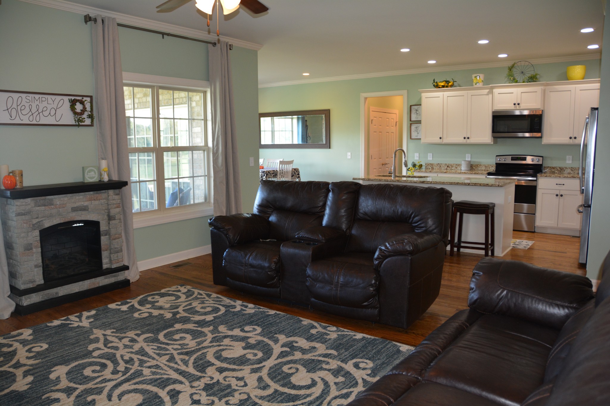 675 Elrod Road Manchester, TN 37355 - Photo 14 of 39 a living room with furniture and a fireplace