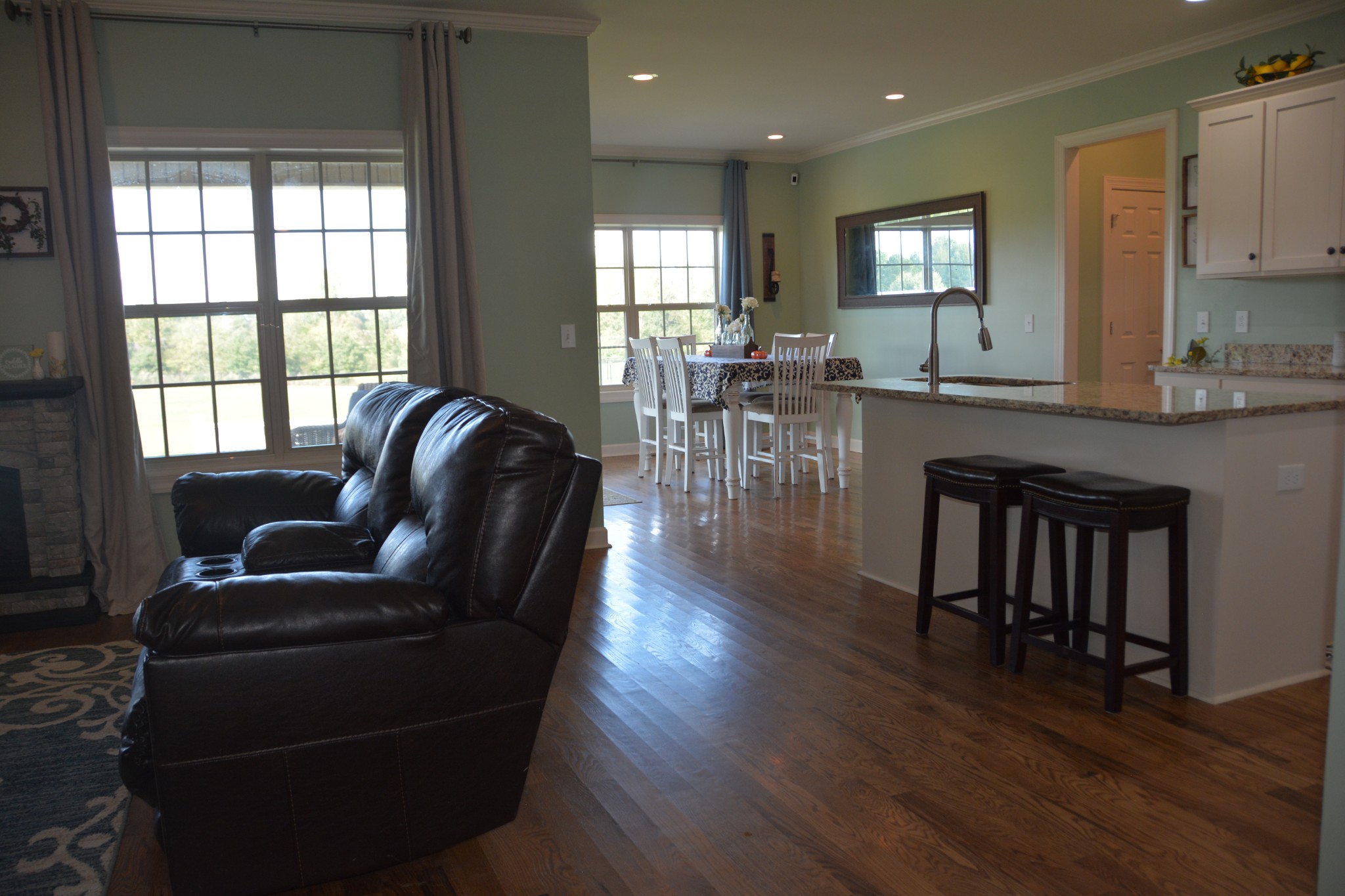 675 Elrod Road Manchester, TN 37355 - Photo 19 of 39 a living room with furniture wooden floor and a large window