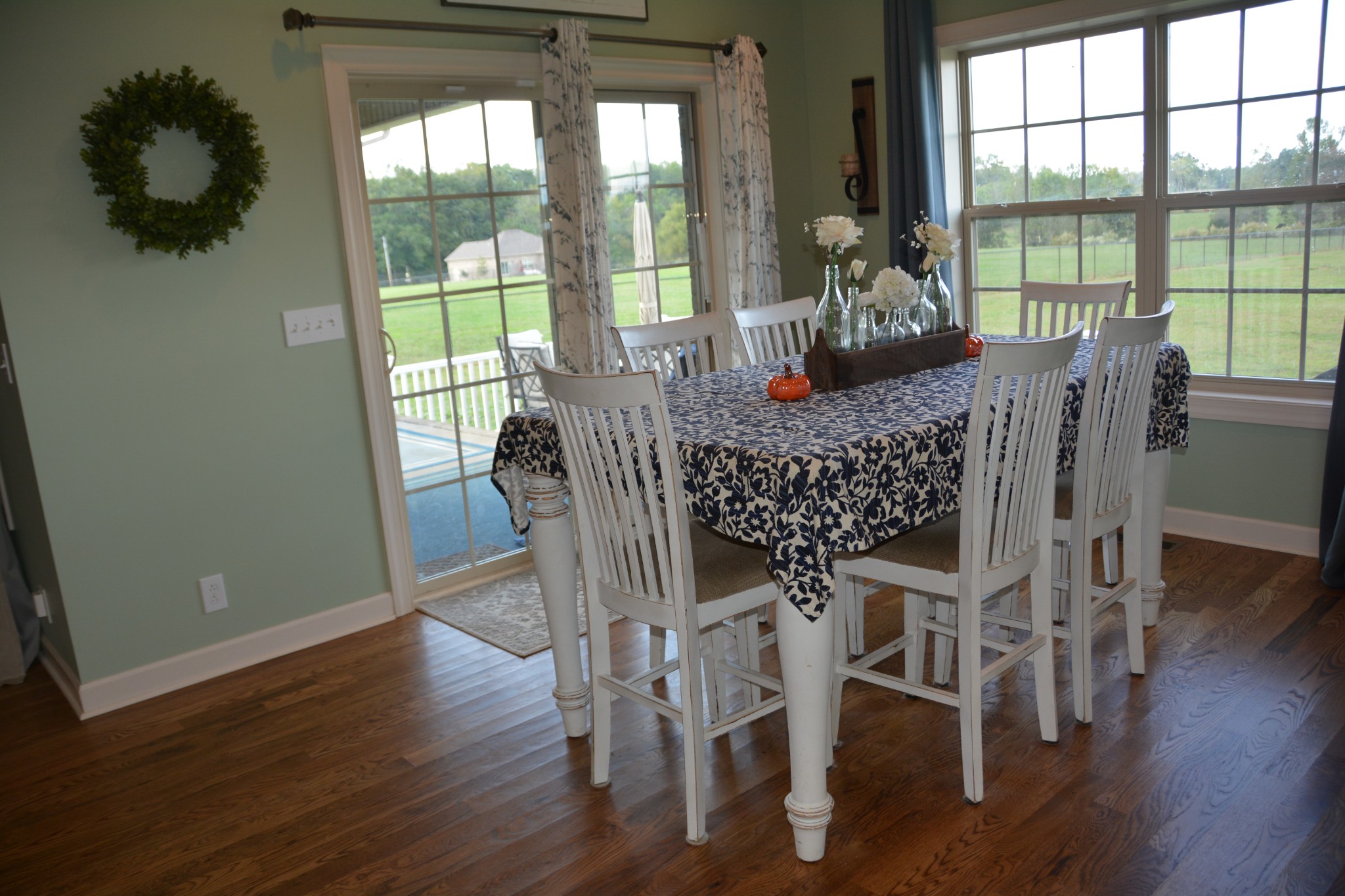 675 Elrod Road Manchester, TN 37355 - Photo 22 of 39 a view of a dining room with furniture and wooden floor