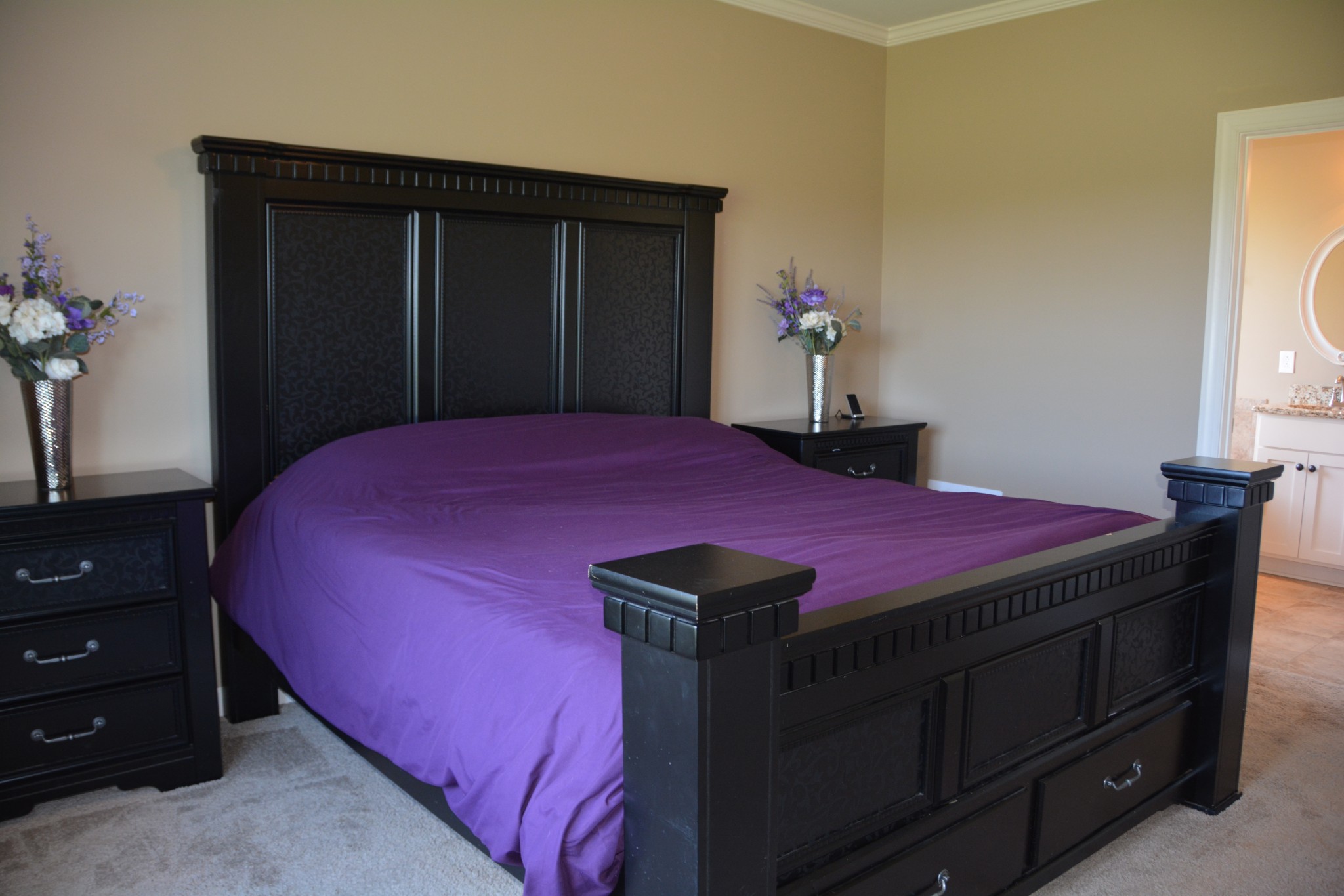 675 Elrod Road Manchester, TN 37355 - Photo 25 of 39 a bedroom with a bed and a mirror on dresser