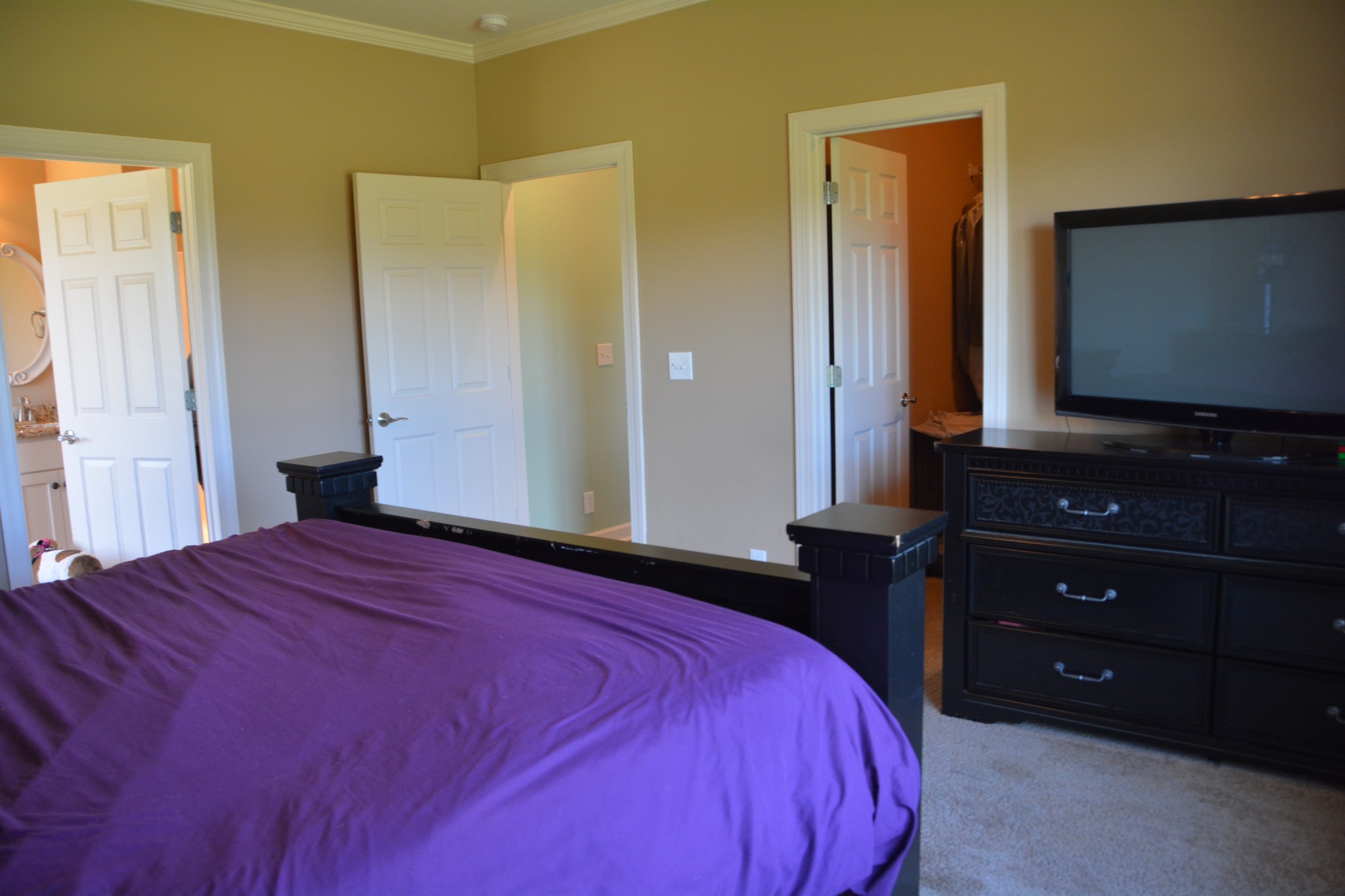 675 Elrod Road Manchester, TN 37355 - Photo 27 of 39 a bedroom with a bed and a flat tv screen on dresser