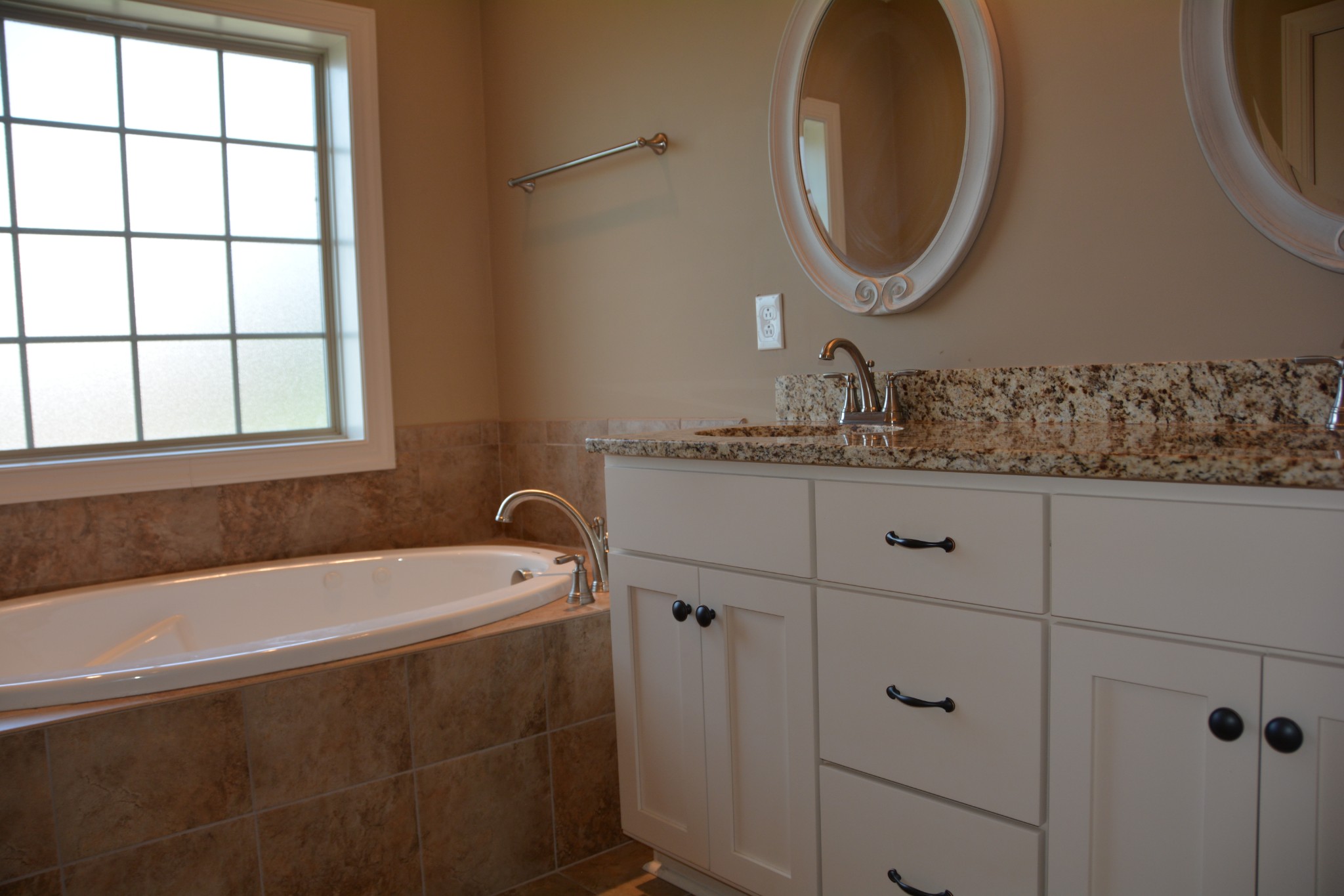 675 Elrod Road Manchester, TN 37355 - Photo 28 of 39 a bathroom with a sink and a mirror