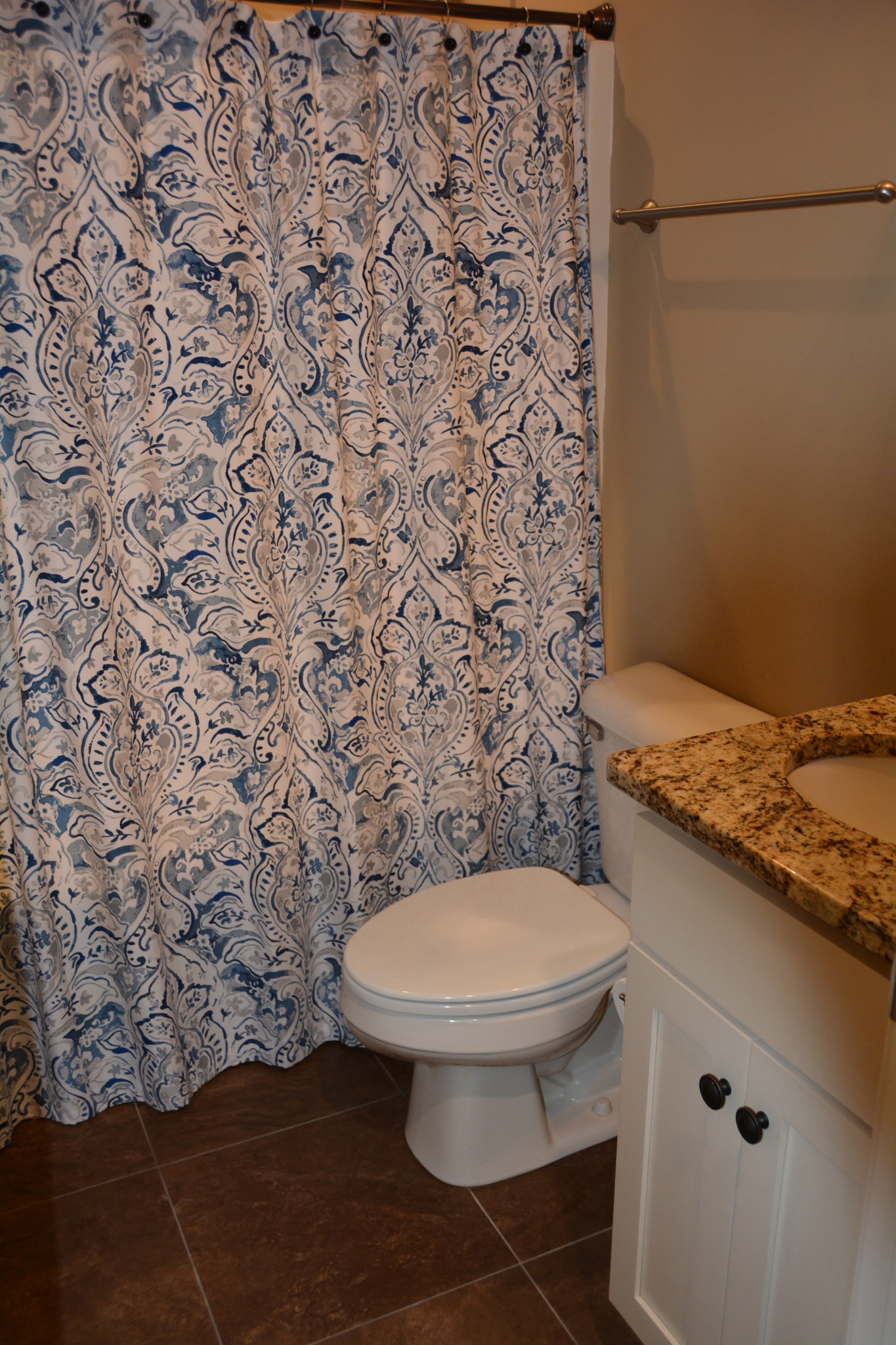 675 Elrod Road Manchester, TN 37355 - Photo 34 of 39 a bathroom with a toilet and a shower curtain