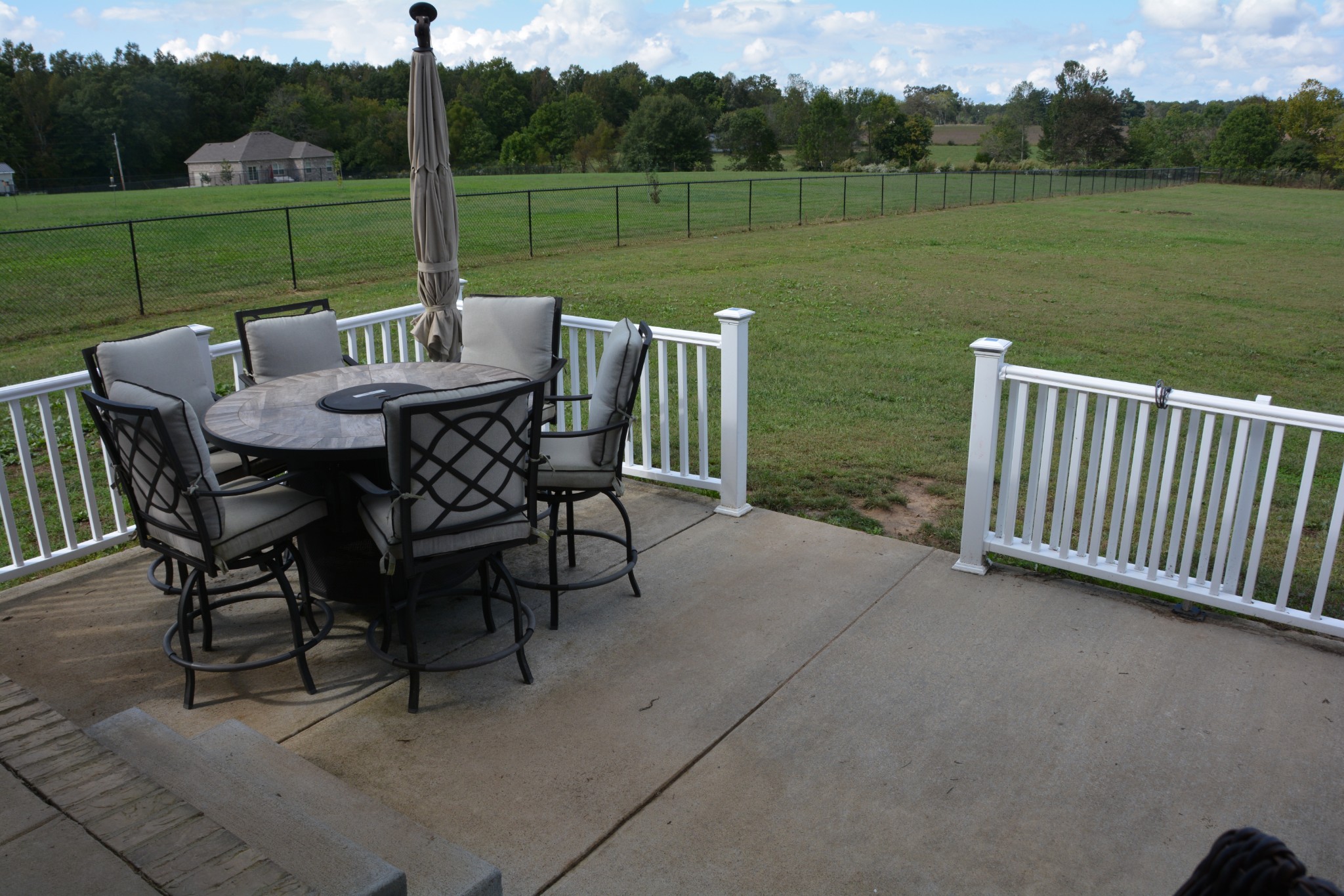 675 Elrod Road Manchester, TN 37355 - Photo 10 of 39 a view of a patio with a table chairs and a yard