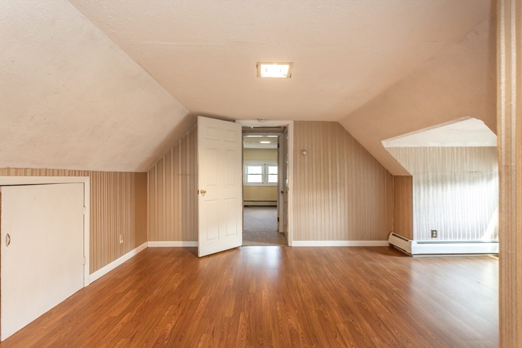 724 High Street Fall River, MA 02720 - Photo 30 of 39 a view of an empty room with wooden floor