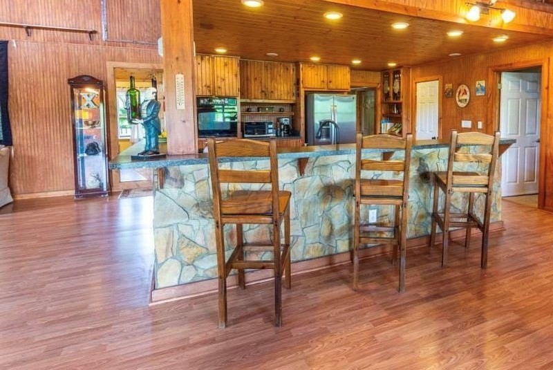 68 Dorr Spring Spring City, TN 37381 - Photo 13 of 42 an outdoor space with patio lots of furniture and wooden floor