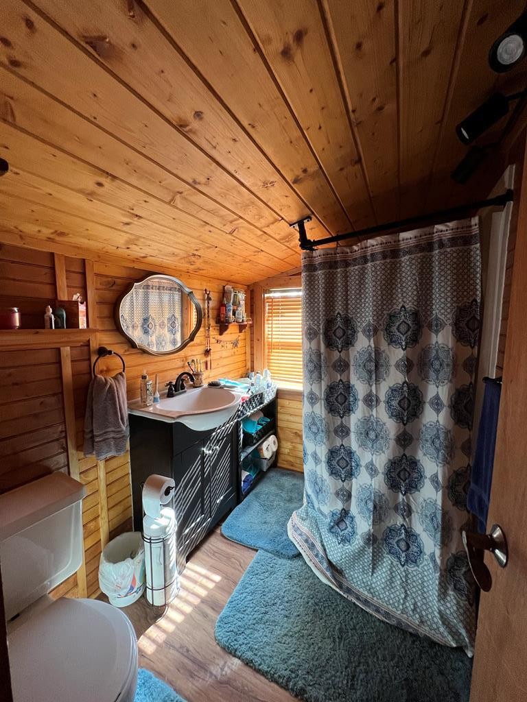 68 Dorr Spring Spring City, TN 37381 - Photo 32 of 42 a room with lots of furniture and a shower