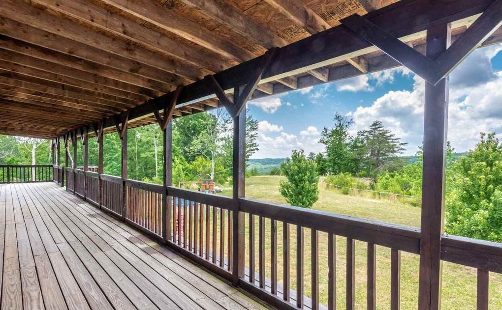 68 Dorr Spring Spring City, TN 37381 - Photo 7 of 42 a view of porch with wooden floor in outdoor space