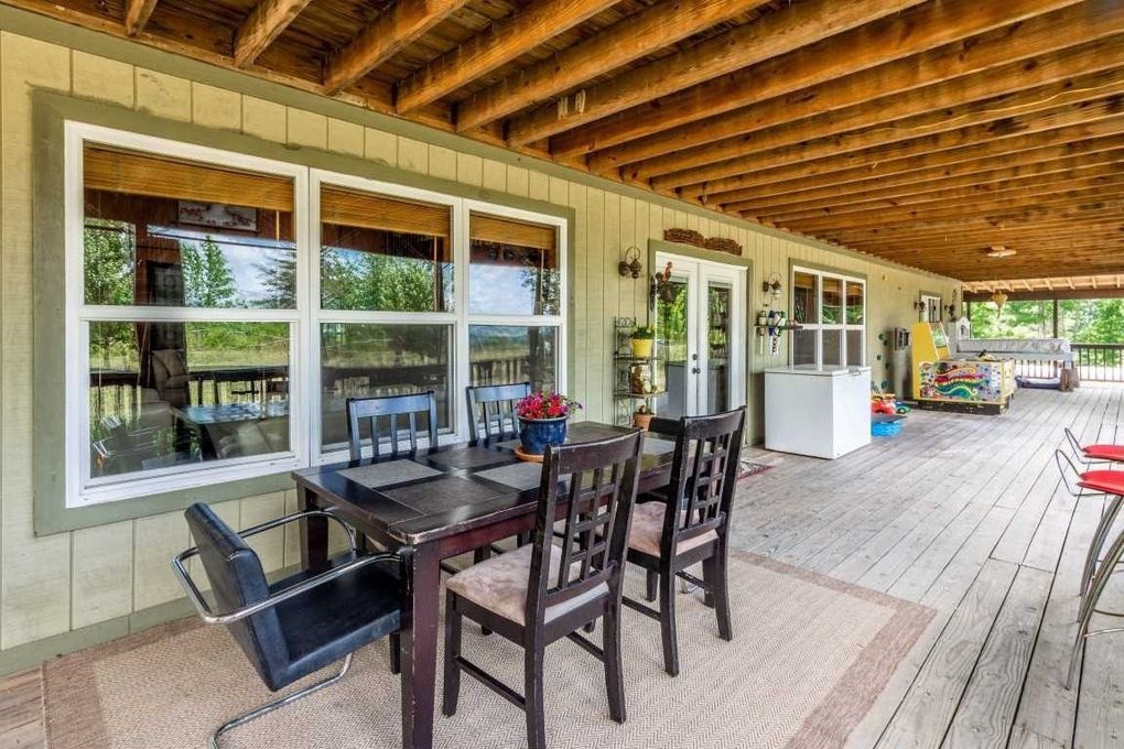 68 Dorr Spring Spring City, TN 37381 - Photo 8 of 42 a view of a patio with table and chairs