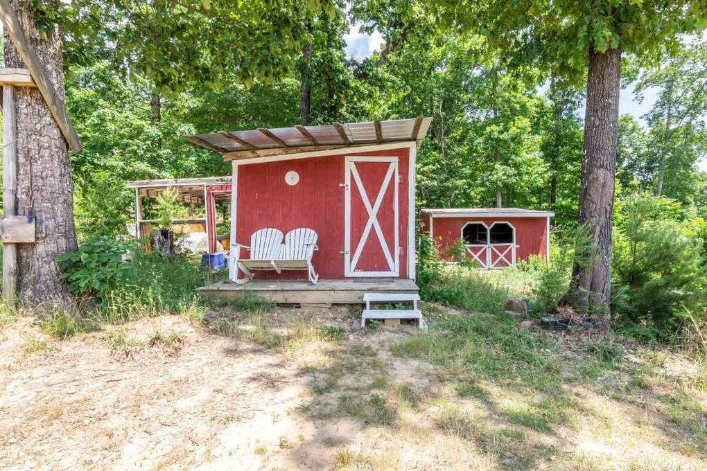 68 Dorr Spring Spring City, TN 37381 - Photo 9 of 42 a backyard of a house with seating space