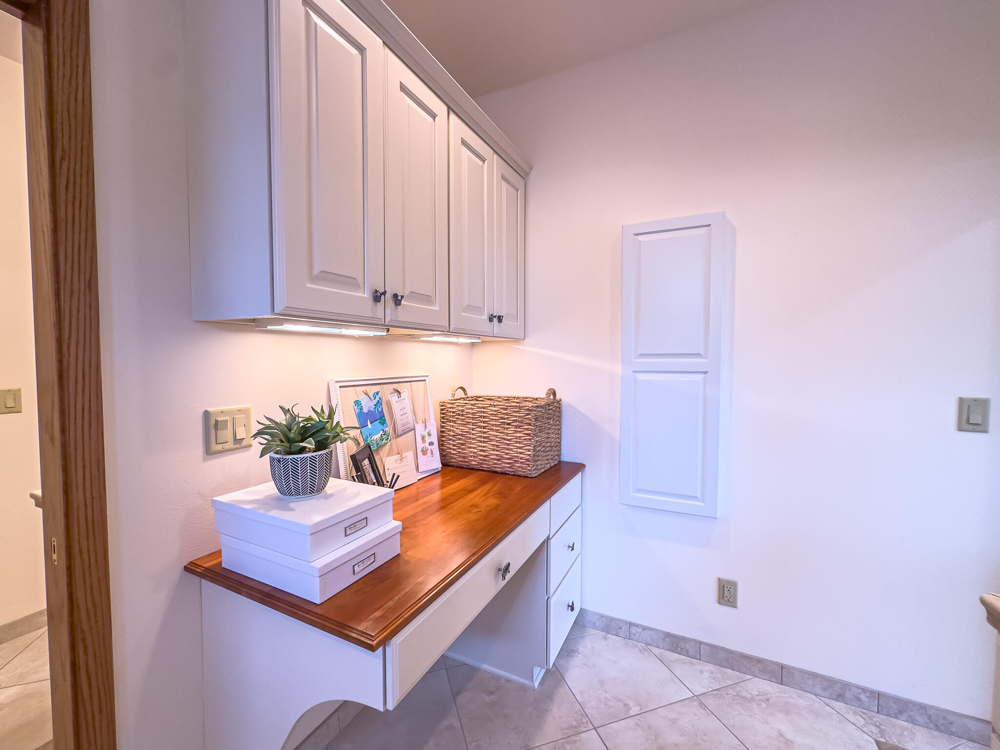 11604 North Granville Road Mequon, WI 53097 - Photo 34 of 49 Use as desk or great area for folding laundry! Built in ironing board too!