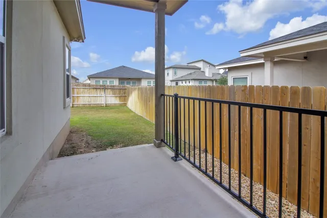 a view of a porch with a yard
