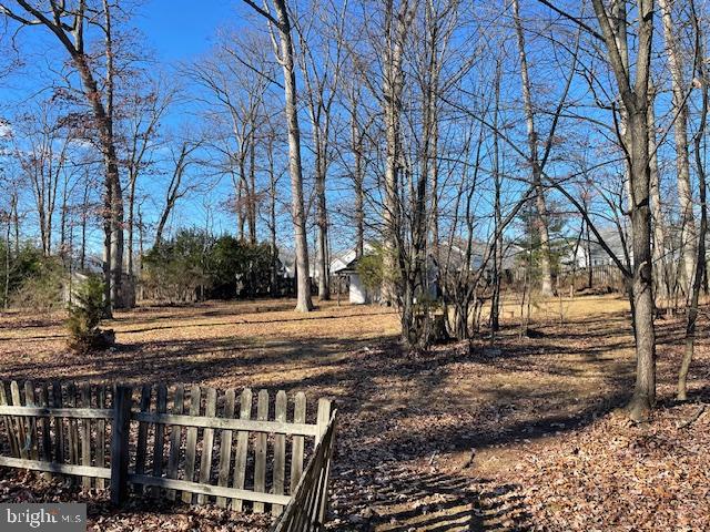 1306 West Orvilla Road Hatfield, PA 19440 - Photo 3 of 14 a view of street with wooden fence