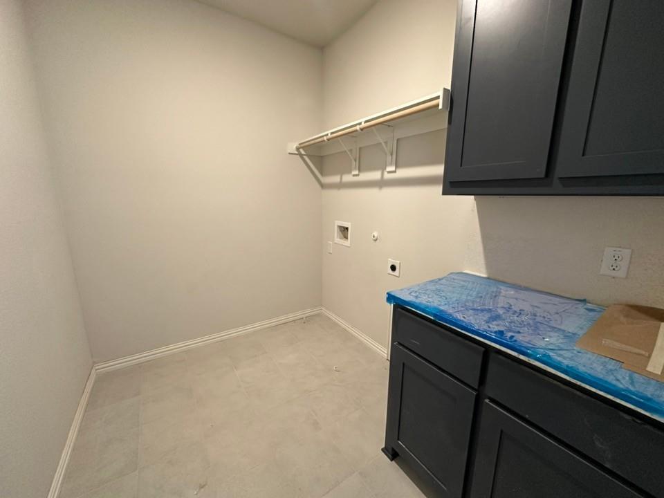 1100 Trinity Drive Springtown, TX 76082 - Photo 8 of 15 a kitchen with a sink and cabinets