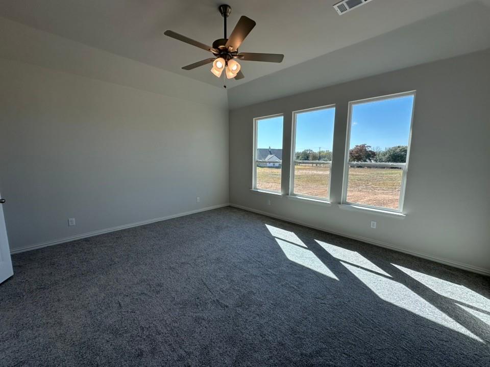 1100 Trinity Drive Springtown, TX 76082 - Photo 9 of 15 a view of an empty room with a window