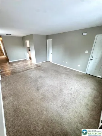 a view of a livingroom with a fireplace