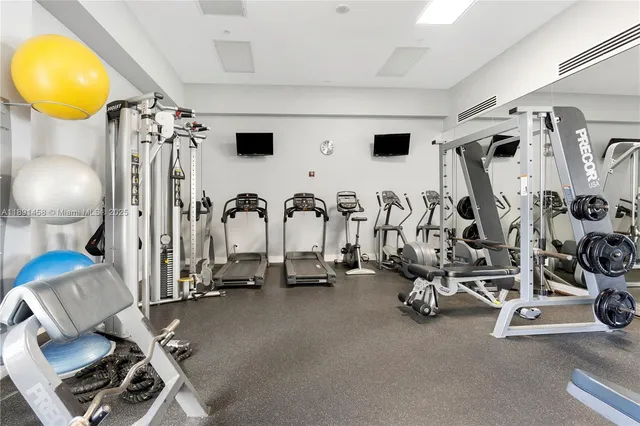 a view of a room with gym equipment
