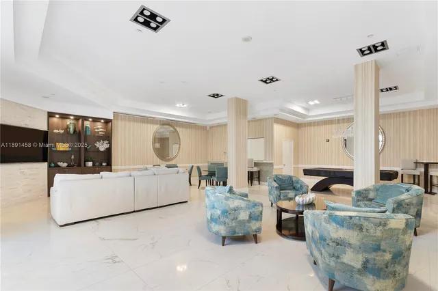 a living room with furniture and a table