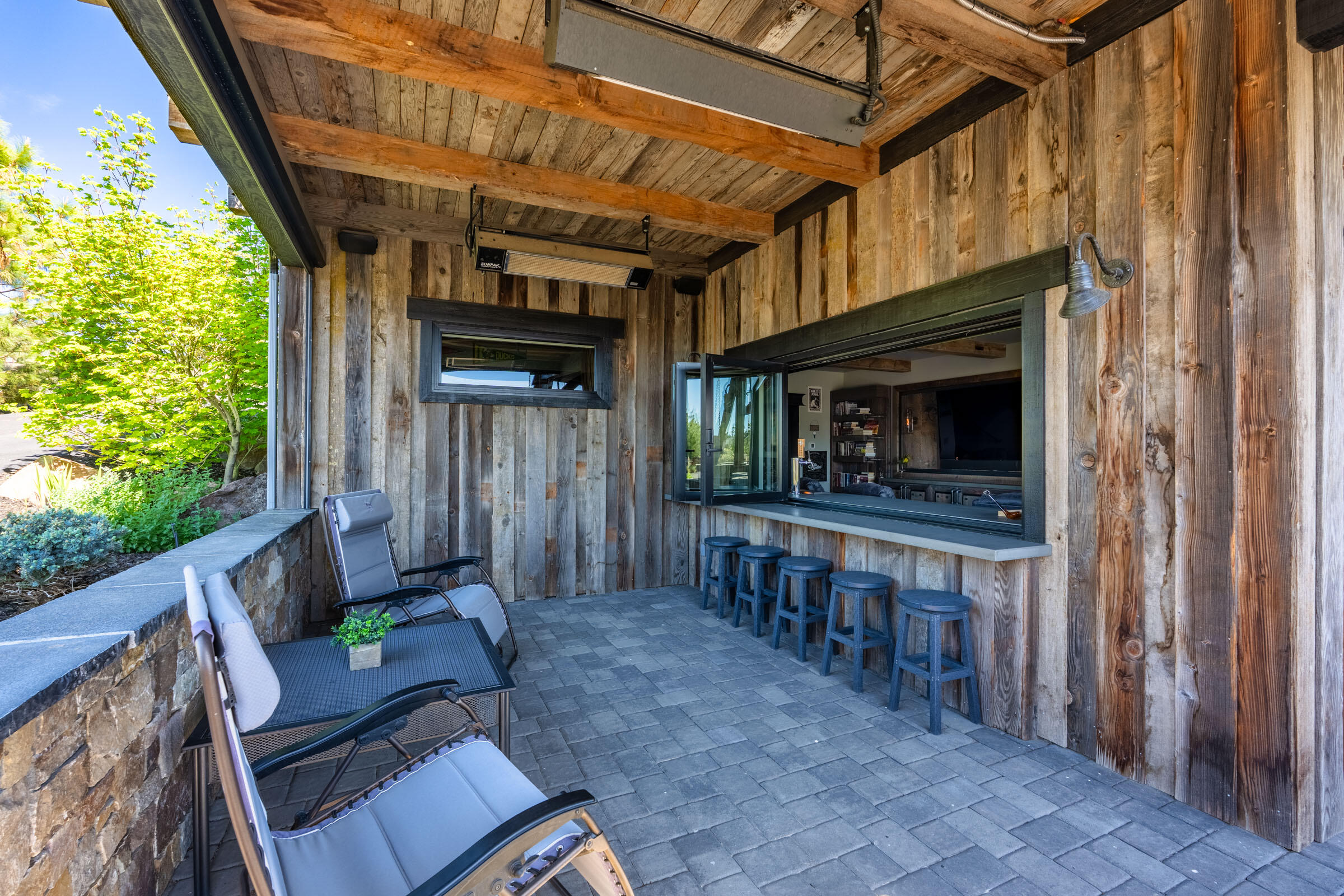 16086 South W Brasada Ranch Road Powell Butte, OR 97753 - Photo 53 of 69 a view of a porch with furniture and a yard