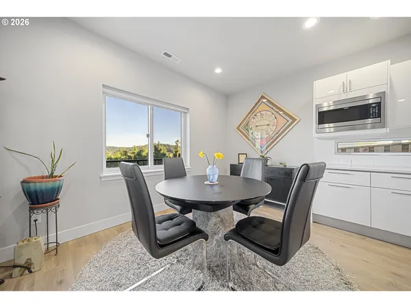 a view of a dining room with furniture