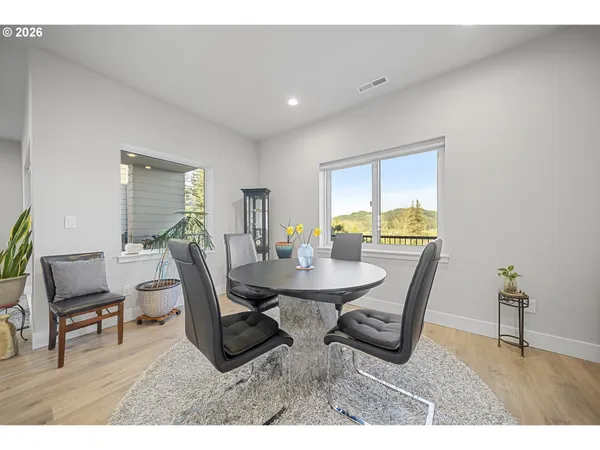 a view of a dining room with furniture