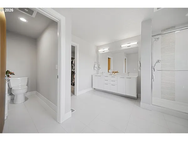 a bathroom with a sink and mirror