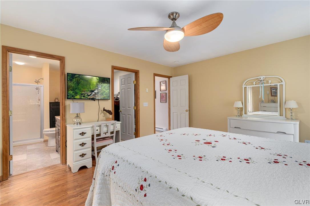 205 Ryan Road Blakeslee, PA 18610 - Photo 13 of 34 a bed room with a bed and a mirror