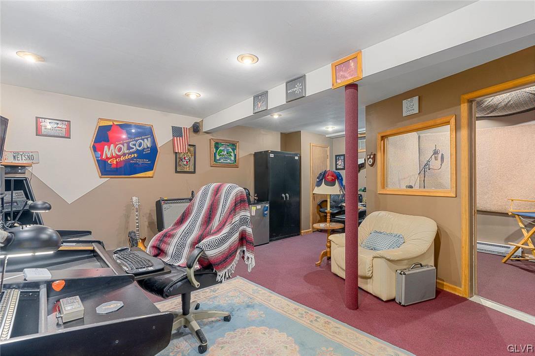 205 Ryan Road Blakeslee, PA 18610 - Photo 24 of 34 a view of a workspace with furniture and toys
