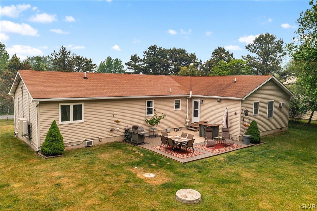 205 Ryan Road Blakeslee, PA 18610 - Photo 26 of 34 a aerial view of a house with swimming pool and furniture