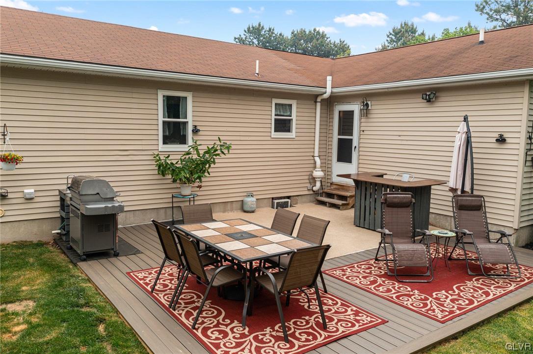 205 Ryan Road Blakeslee, PA 18610 - Photo 27 of 34 a backyard of a house with table and chairs