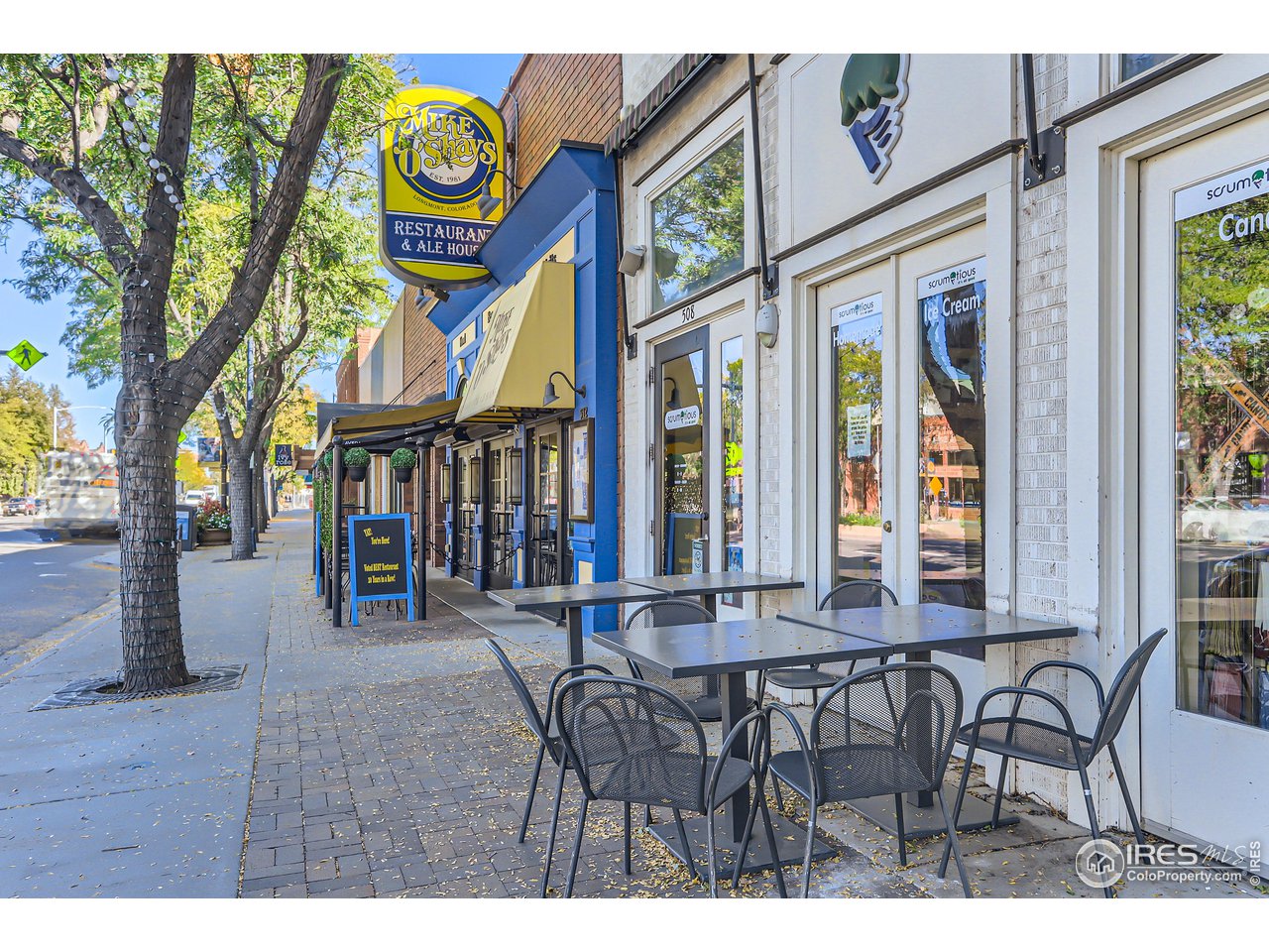 25 Reed Place Longmont, CO 80504 - Photo 23 of 30 a view of an chairs and table in a room