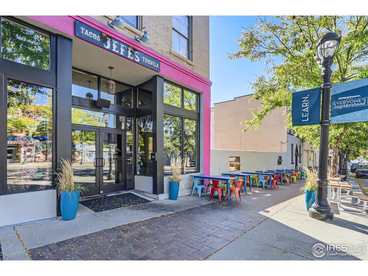 25 Reed Place Longmont, CO 80504 - Photo 24 of 30 a black and white photo of a living room