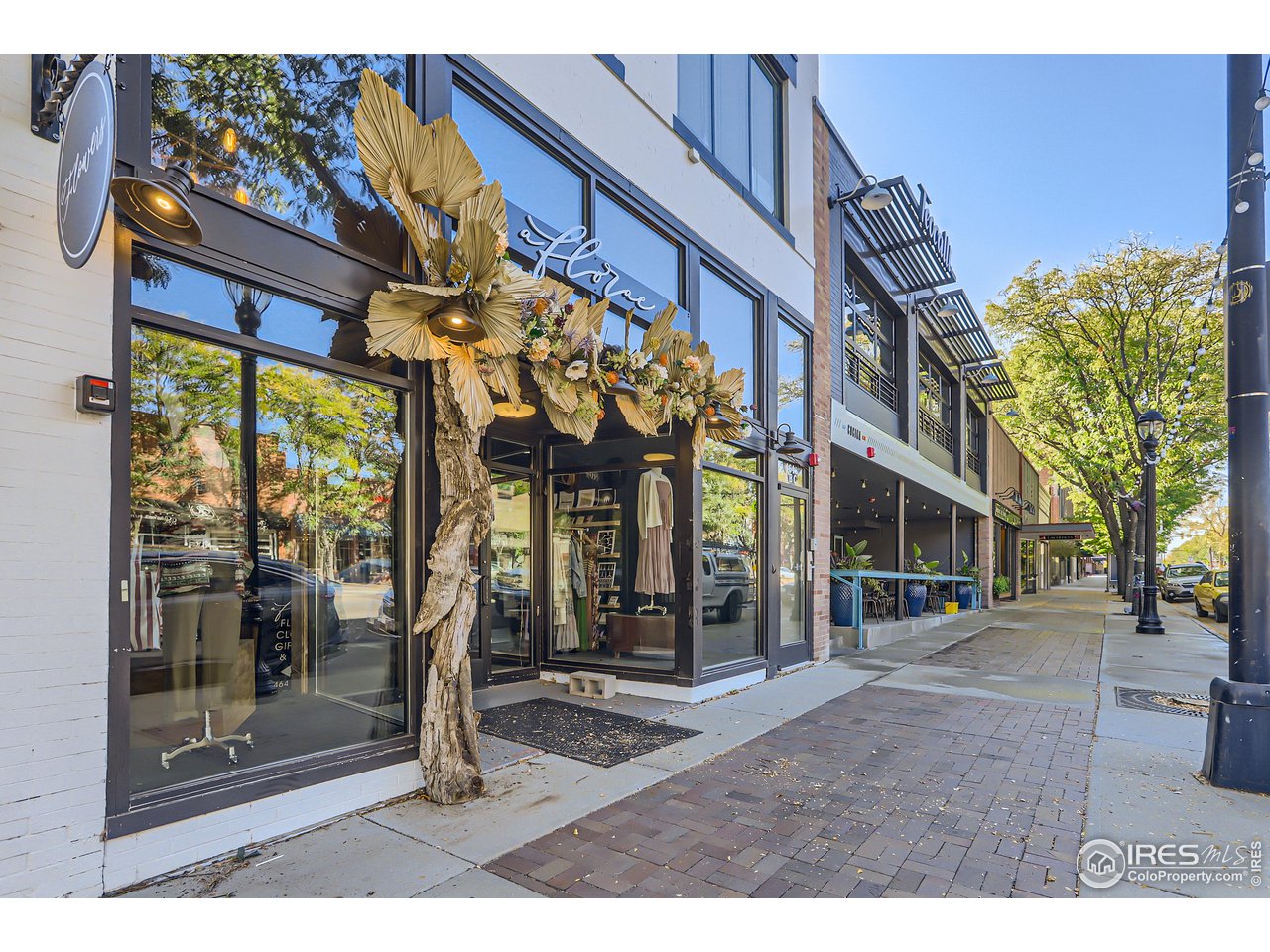 25 Reed Place Longmont, CO 80504 - Photo 26 of 30 a view of a building with a glass door