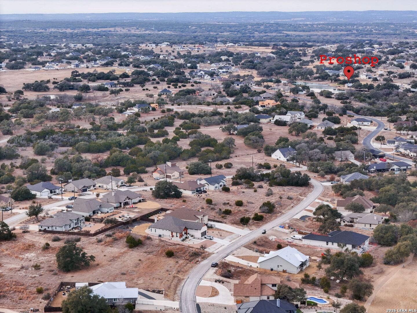 126 Lewis Todd Blanco, TX 78606 - Photo 2 of 8 an aerial view of a city