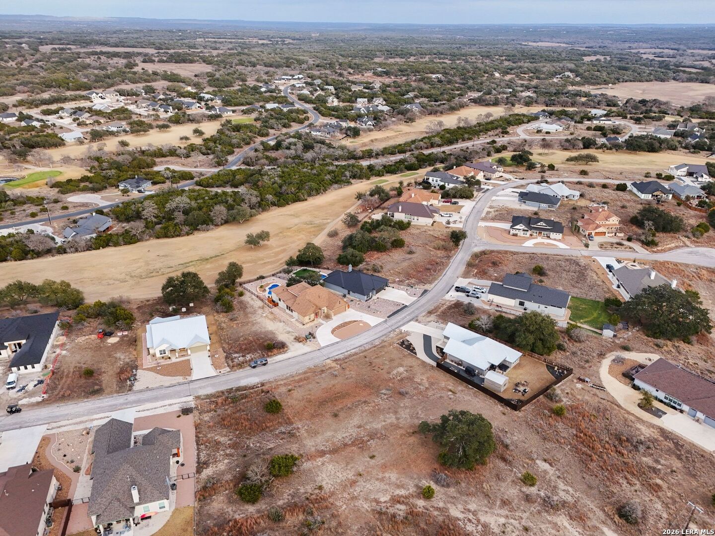 126 Lewis Todd Blanco, TX 78606 - Photo 4 of 8 an aerial view of residential houses with outdoor space