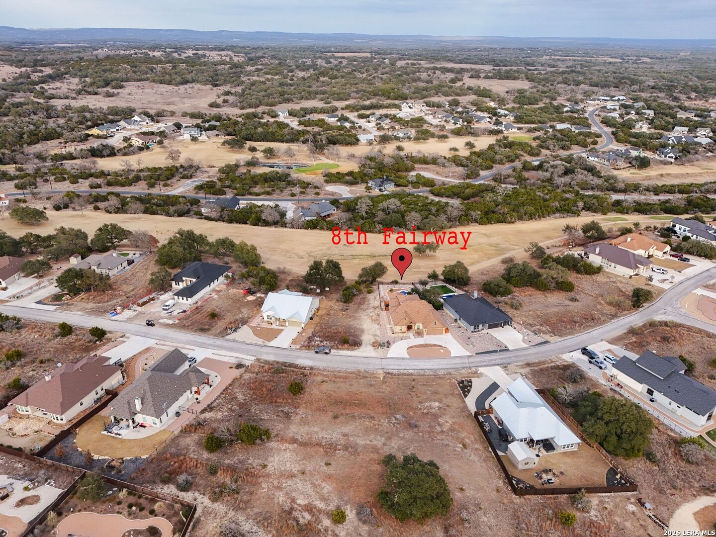126 Lewis Todd Blanco, TX 78606 - Photo 5 of 8 an aerial view of residential houses with outdoor space