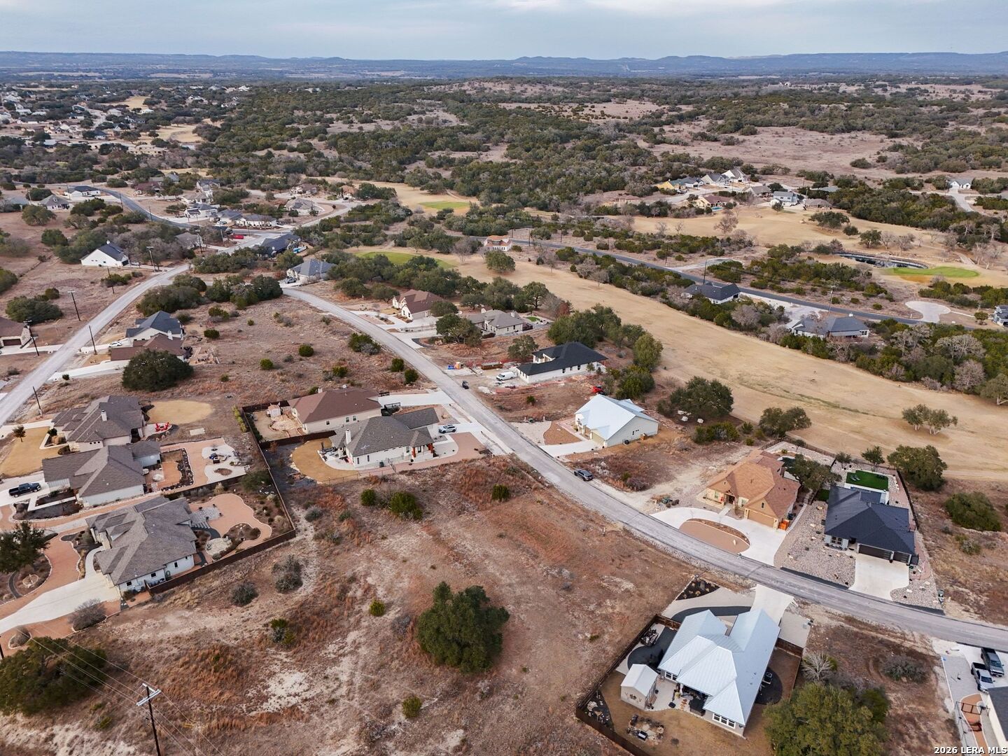 126 Lewis Todd Blanco, TX 78606 - Photo 6 of 8 an aerial view of multiple house