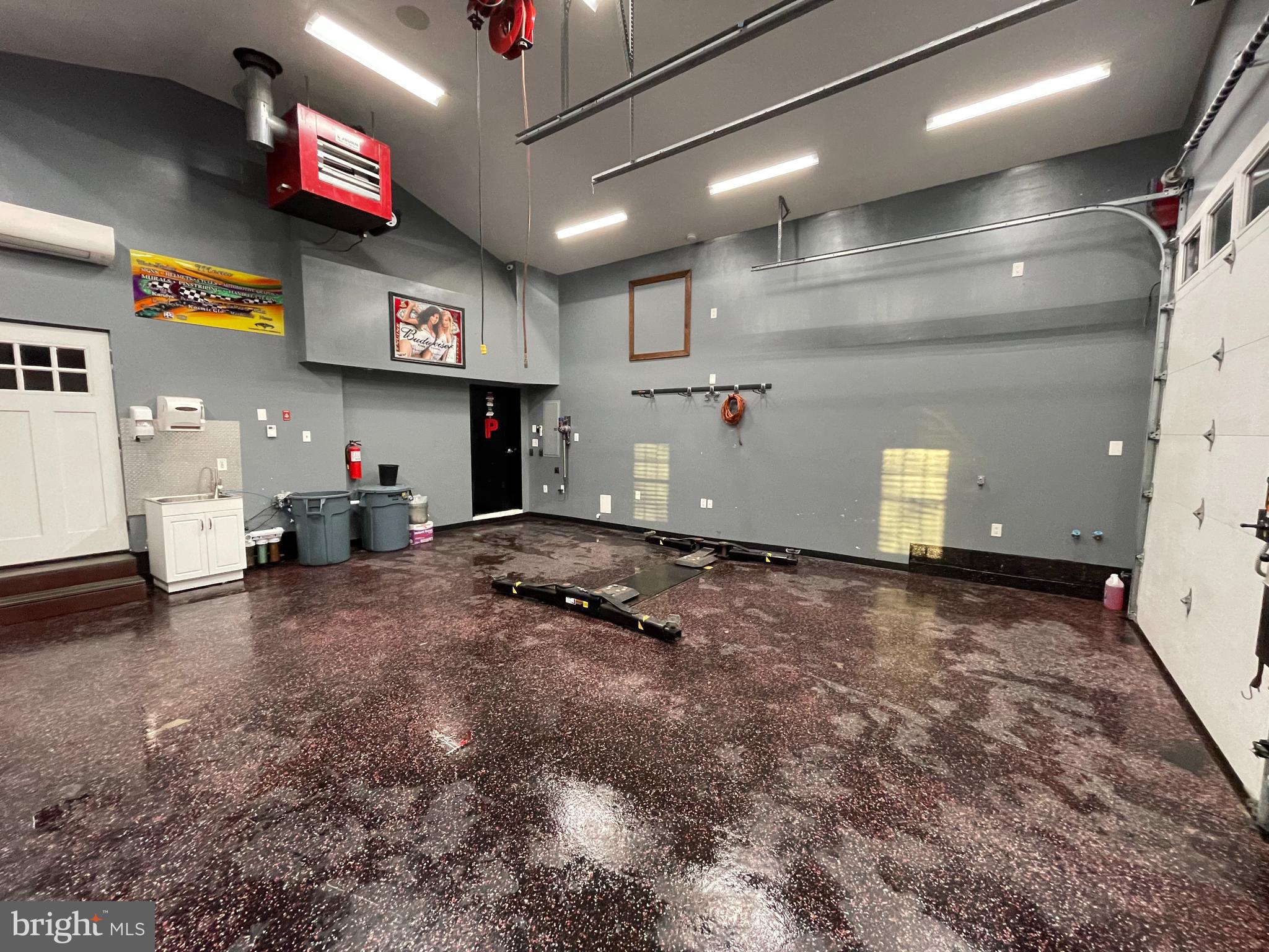 9 Gatewood Road Levittown, PA 19057 - Photo 32 of 72 Epoxy painted garage floor