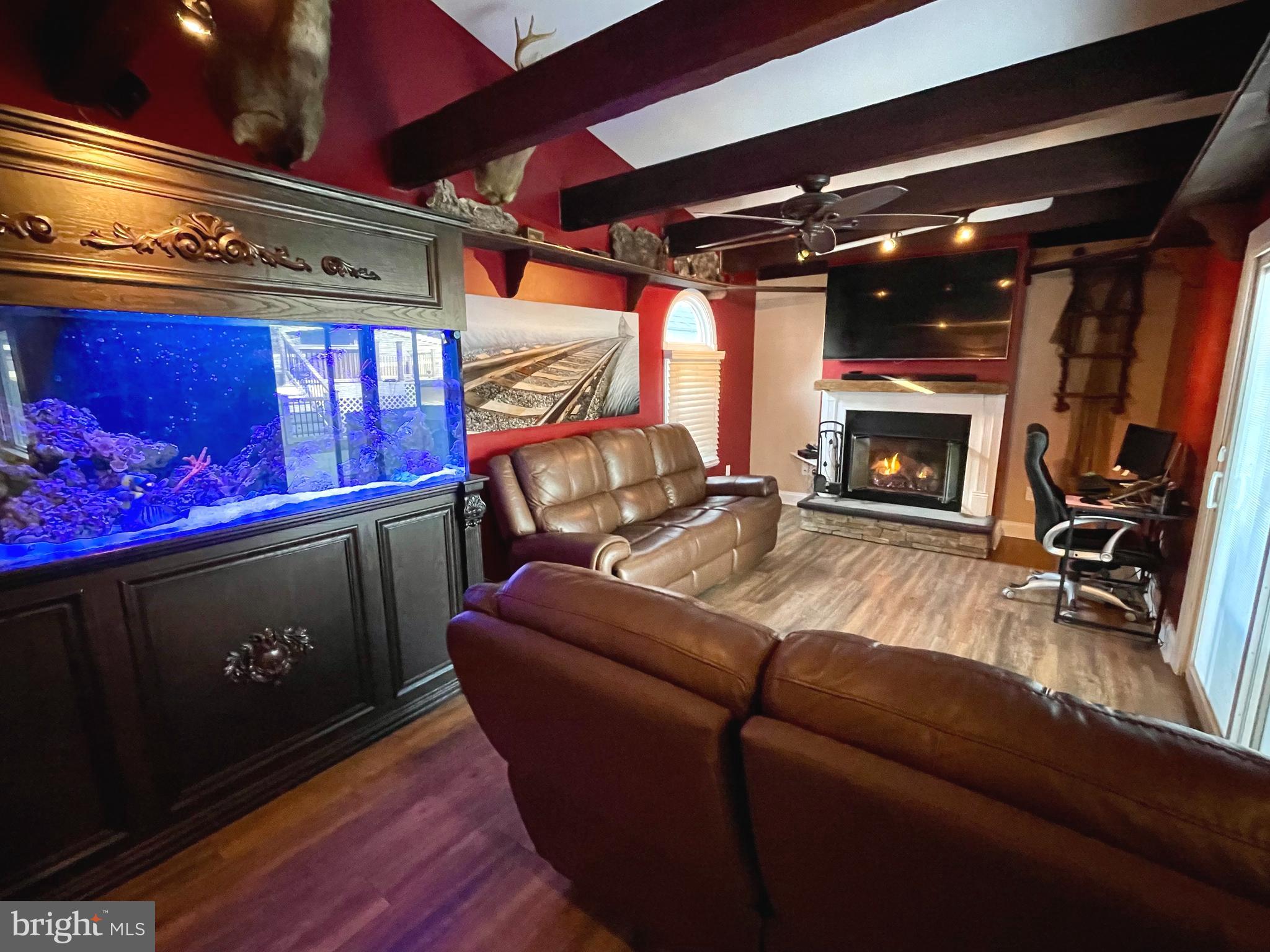 9 Gatewood Road Levittown, PA 19057 - Photo 54 of 72 Family room w/ fireplace and SGD