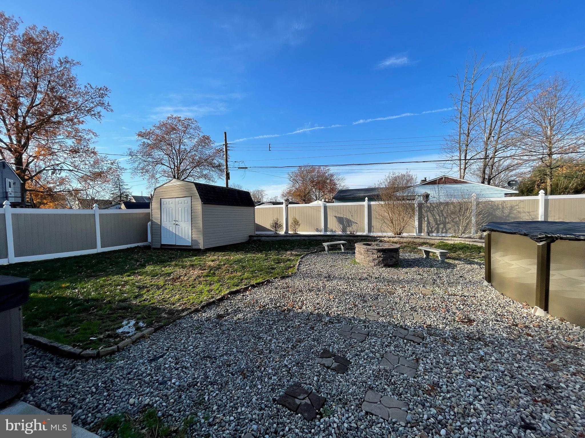9 Gatewood Road Levittown, PA 19057 - Photo 68 of 72 Fenced rear yard with patio, pool, decks & sheds