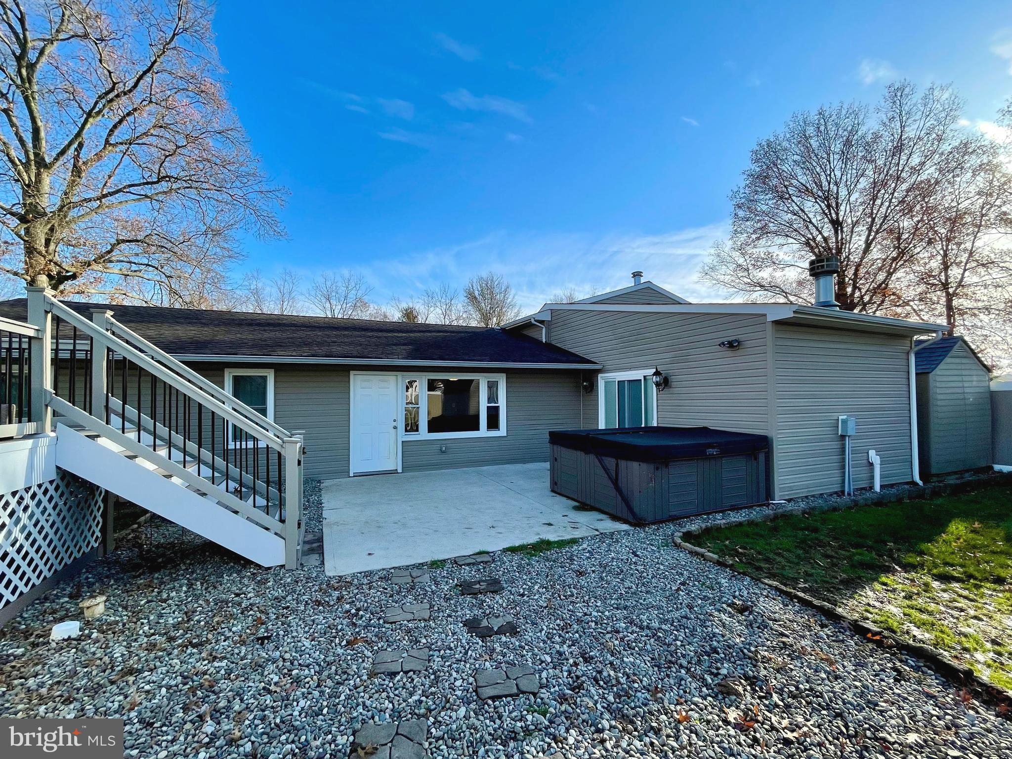 9 Gatewood Road Levittown, PA 19057 - Photo 69 of 72 Fenced rear yard with patio, pool, decks & sheds